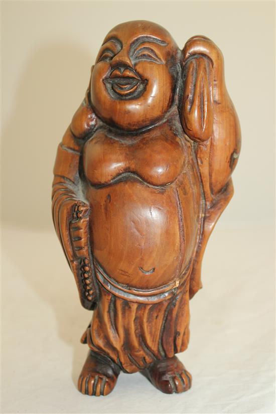 A Chinese boxwood carving of Budai, 22cm